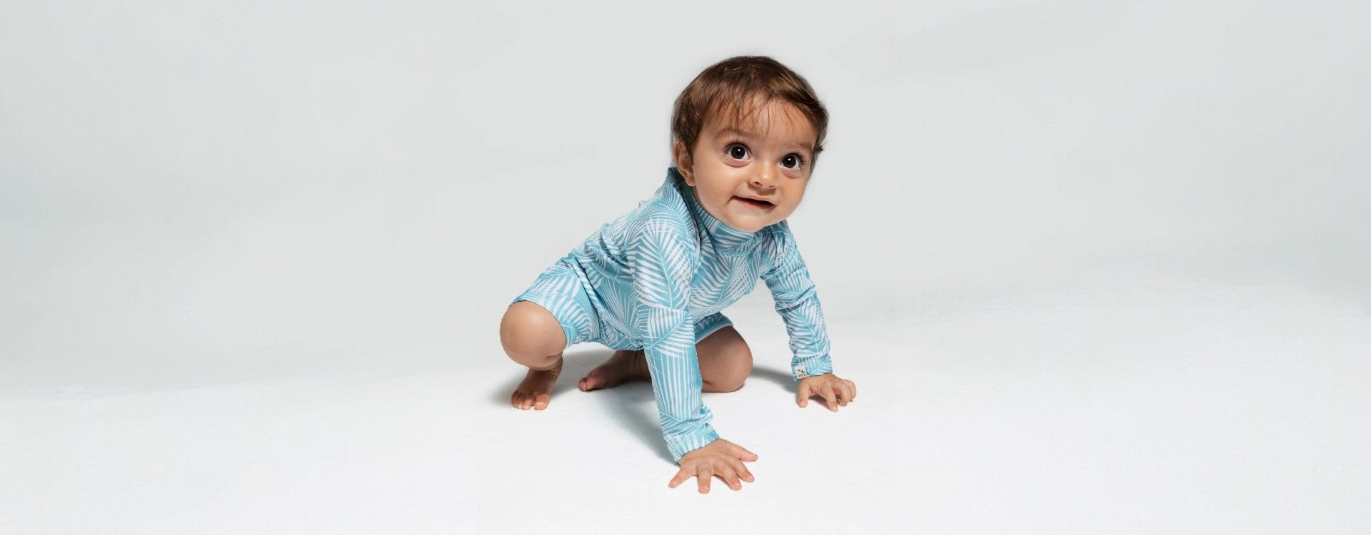 Baby in Green Fern Swimsuit