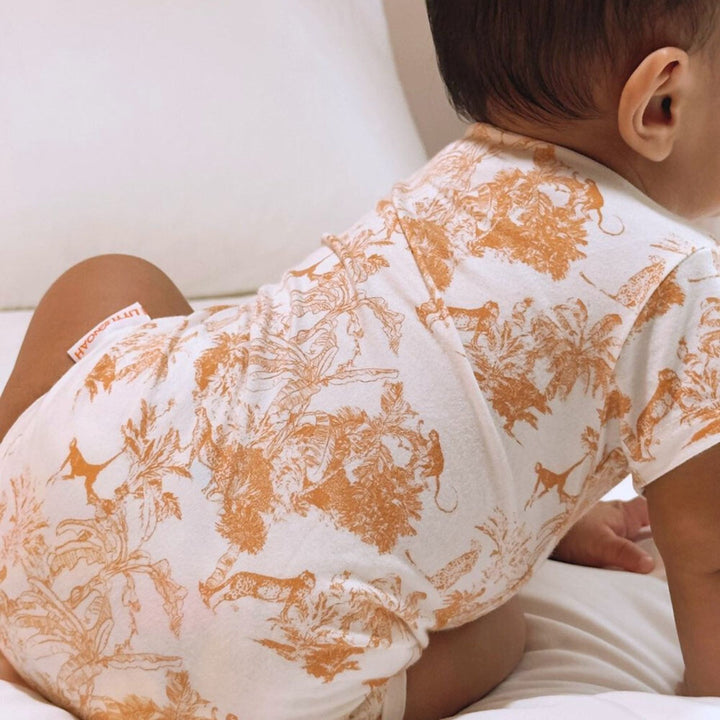 Baby wearing Little Noah Premium Bamboo Safari Classic Romper in Orange\
