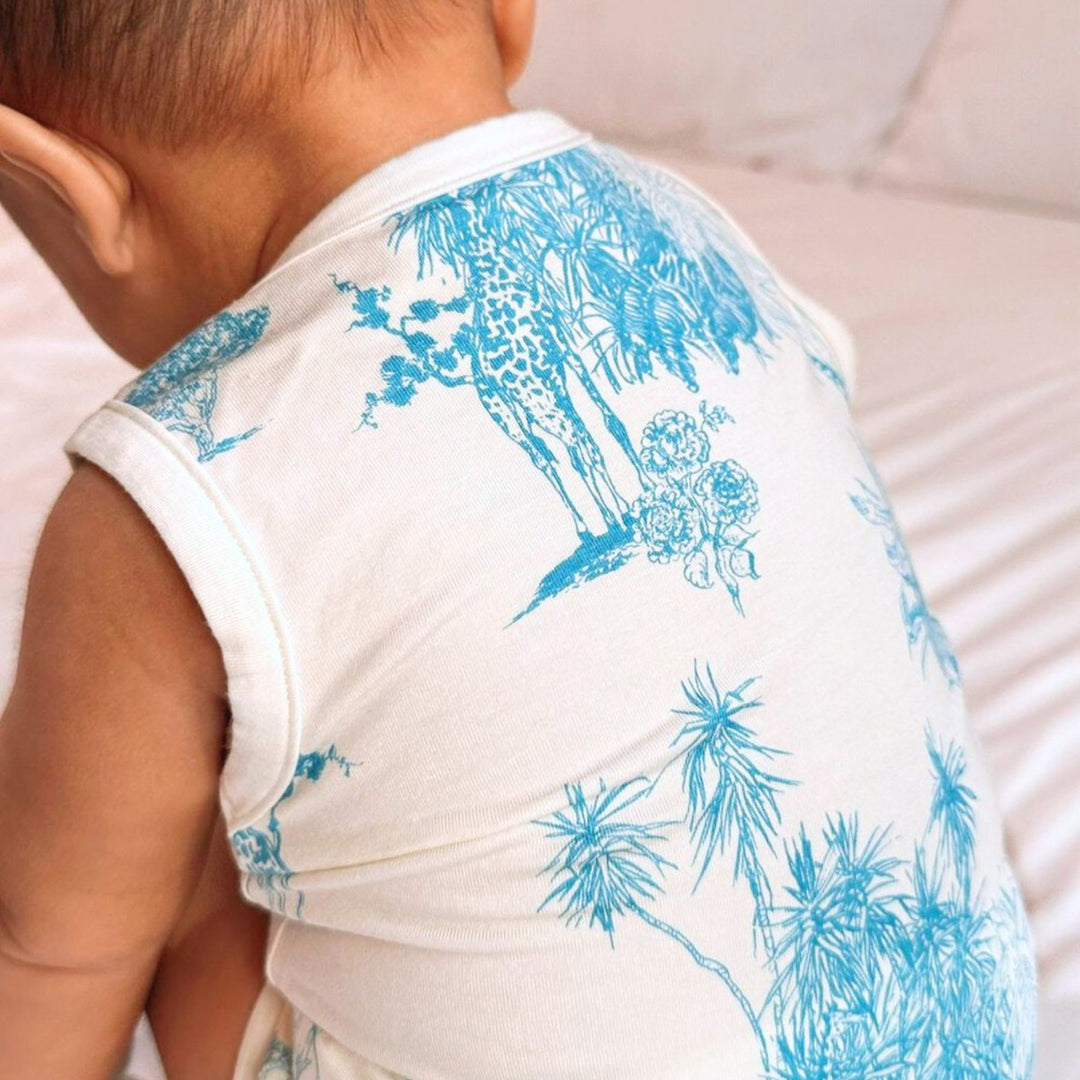Baby wearing Little Noah Bamboo Safari Sleeveless Romper in Blue