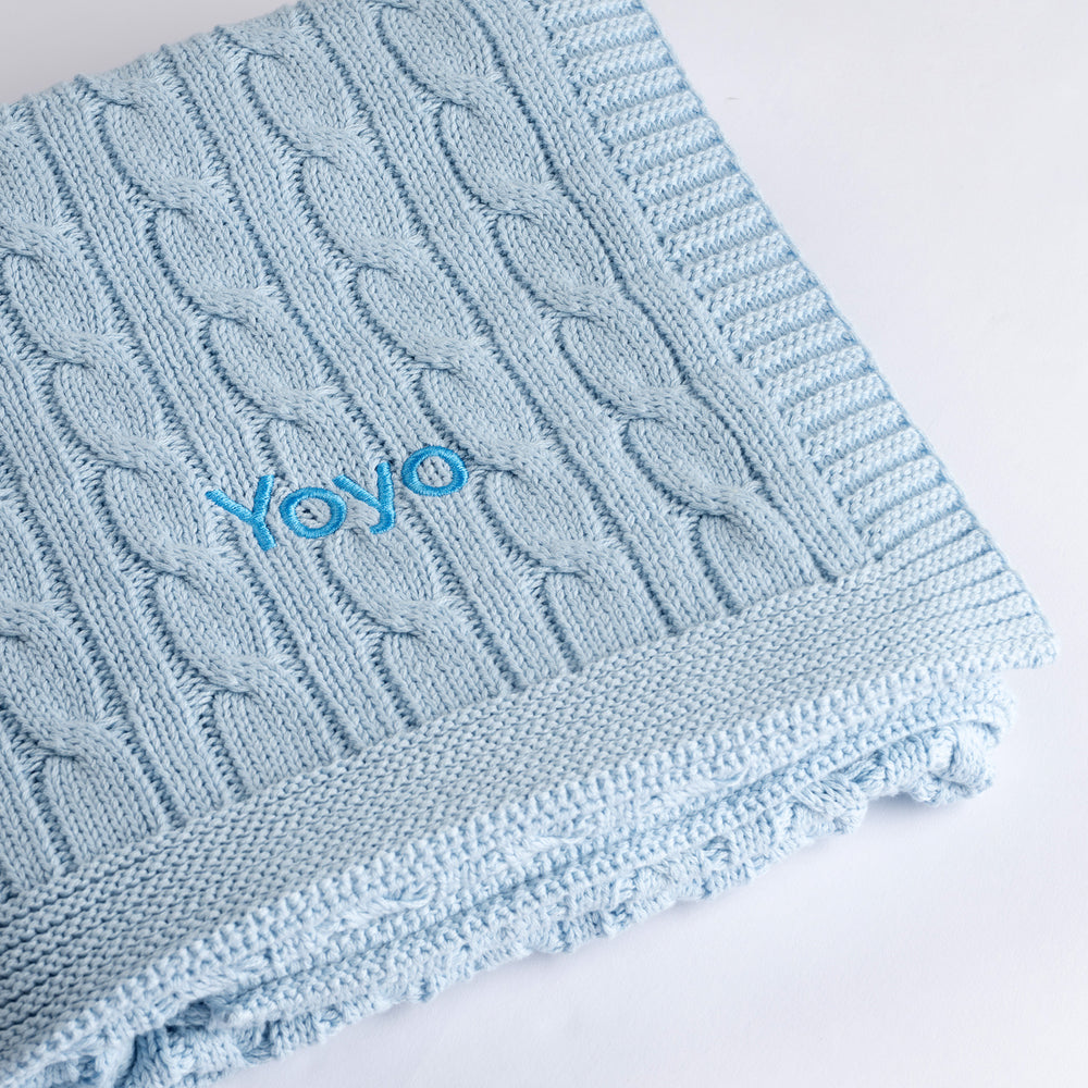 Experience ultimate luxury with this premium blue cable knit baby blanket, customised in blue thread
