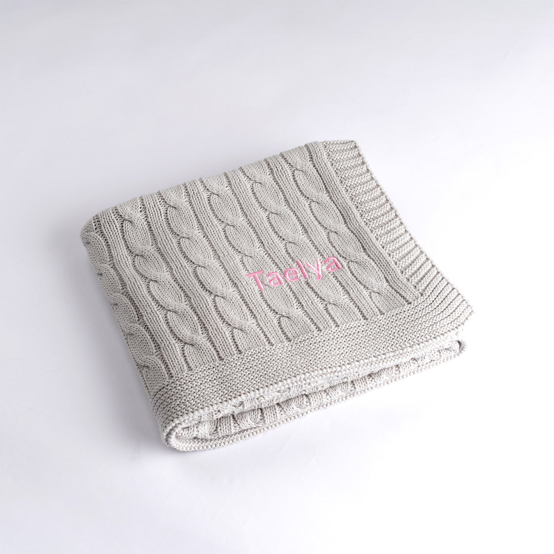 Grey Cable Knit Blanket personalised with "Taelya" in Pink