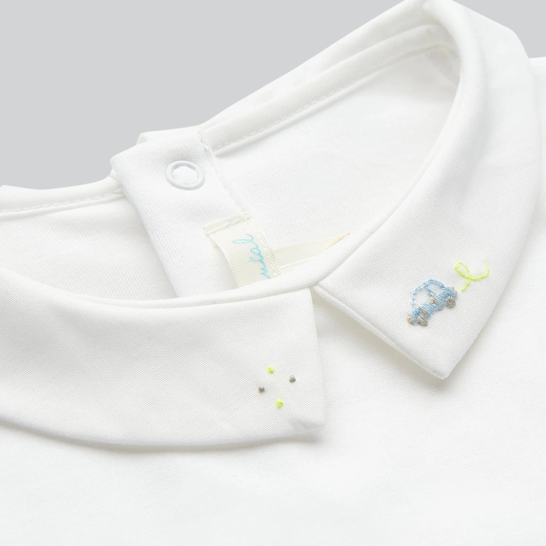 Close up of Marie Chantal's Ethan Embroidered Collar Onesie - Car