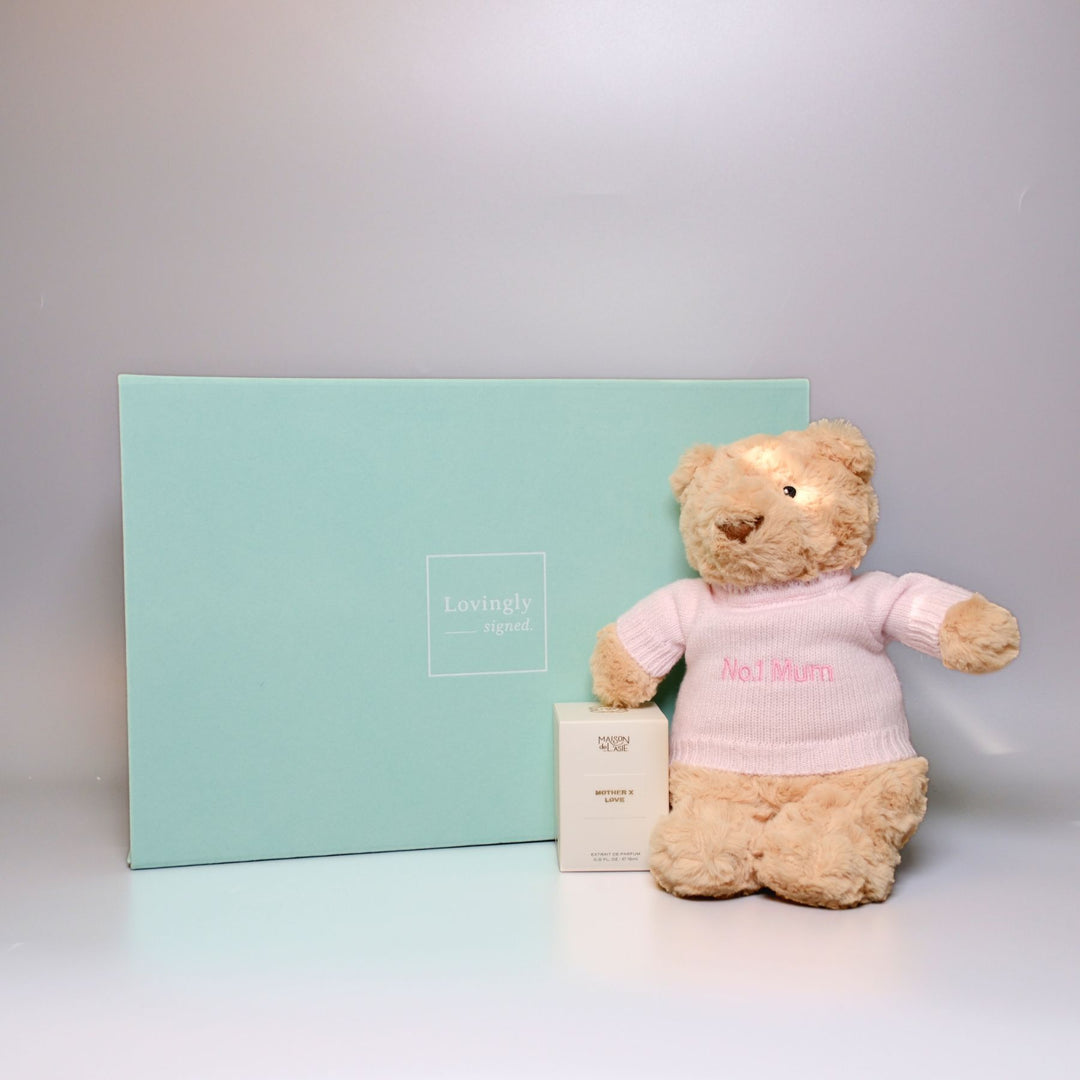 Exclusive Mother’s Day hamper featuring a soft No.1 Mum bear and elegant Mother x Love fragrance – thoughtful and luxurious gift for mum.