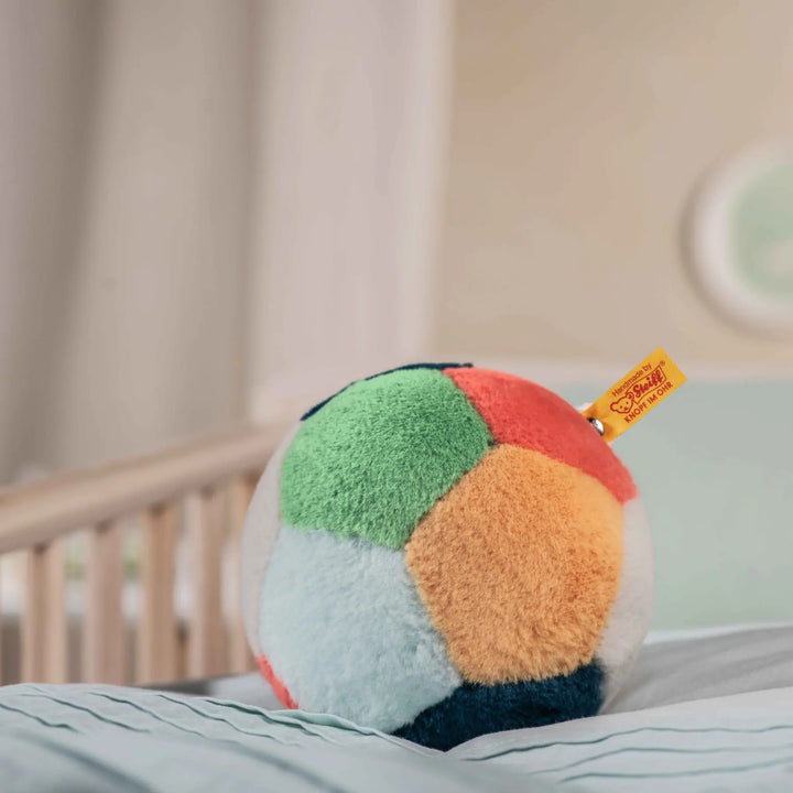Close-up of steiff musical ball, soft and loved by many.