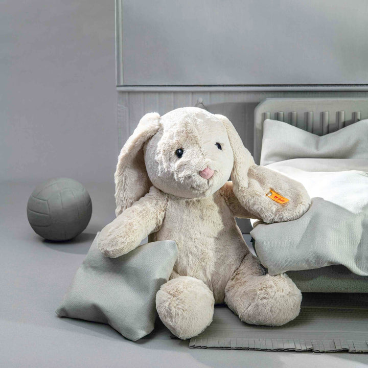 Cuddly grey rabbit soft toy with bean bag paws and ears, ideal for snuggles and playtime