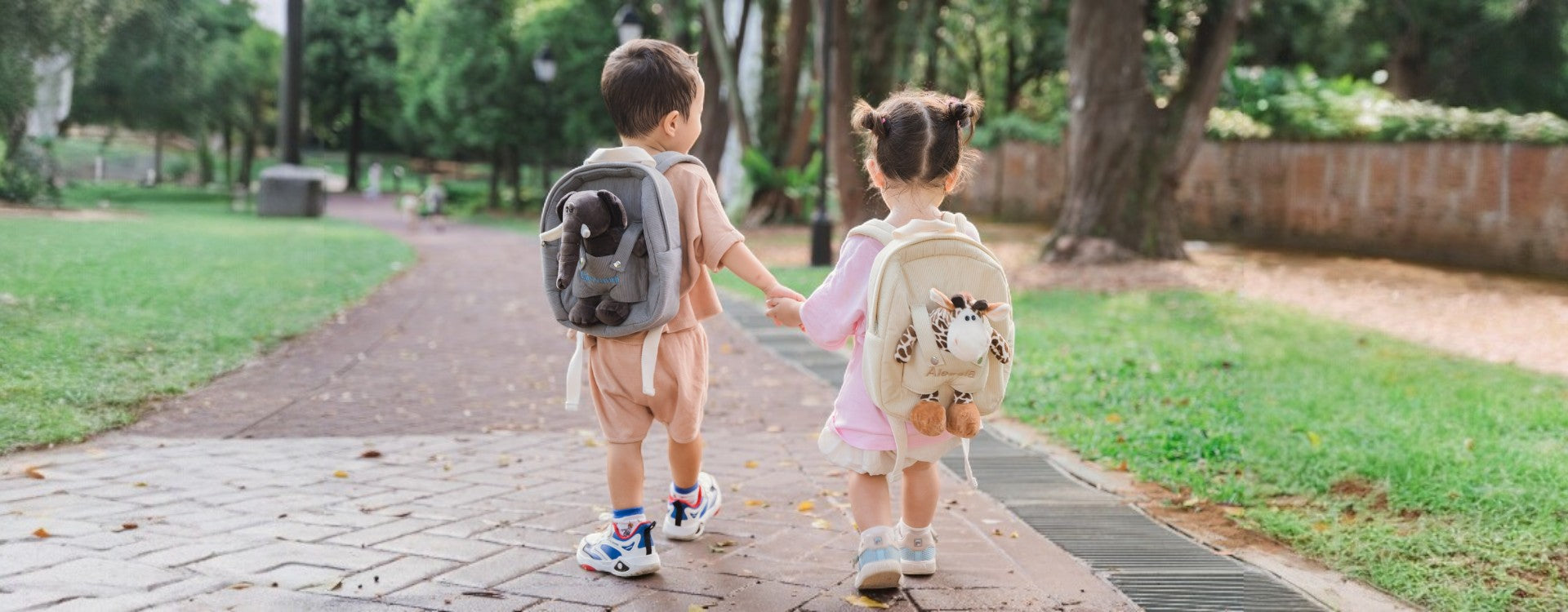Toddlers carrying personalised animal backpack