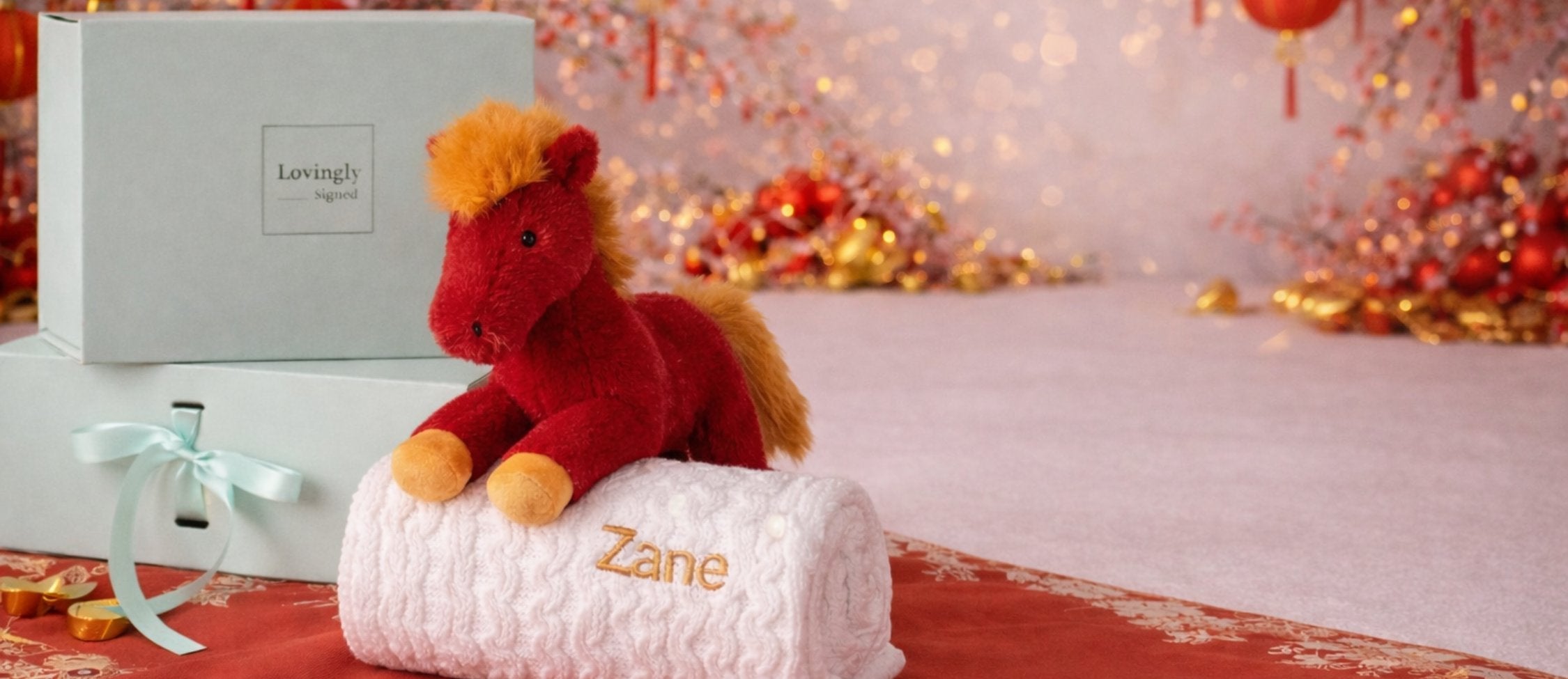 Baby gift hamper with a Jellycat horse and personalised blanket