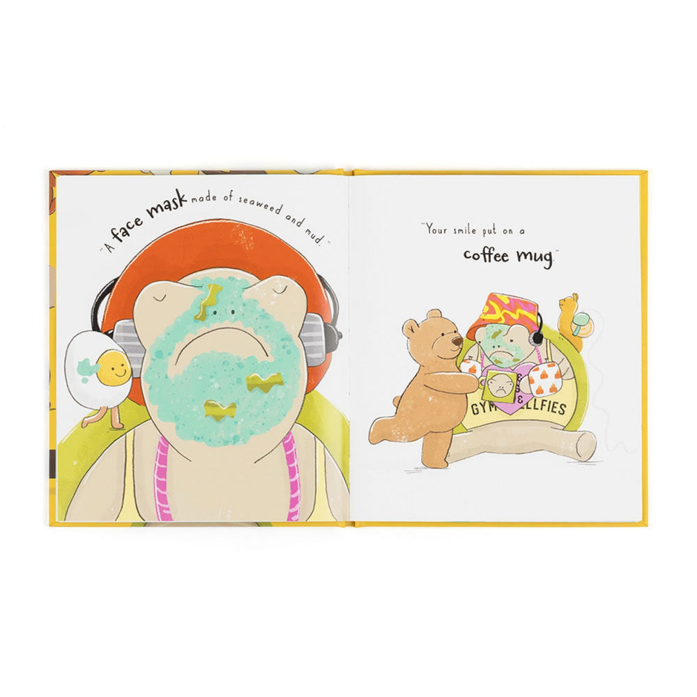Open children’s picture book showing colourful illustrations of the characters, including a face mask scene and a humorous “coffee mug” page.