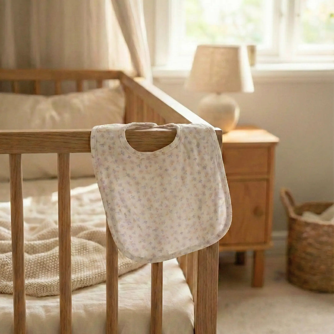 Jamie Kay Organic Cotton Bib - Aries Mauve in Bedroom