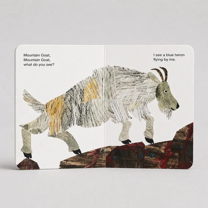 A children's picture book spread showing the classic 'Mountain Goat' illustration on both pages, photographed against a neutral light gray background.
