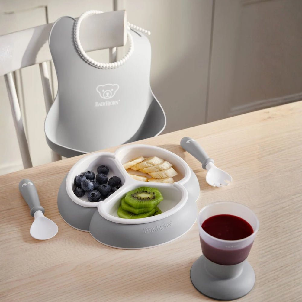 BabyBjörn feeding set with BPA-free materials for healthy eating.