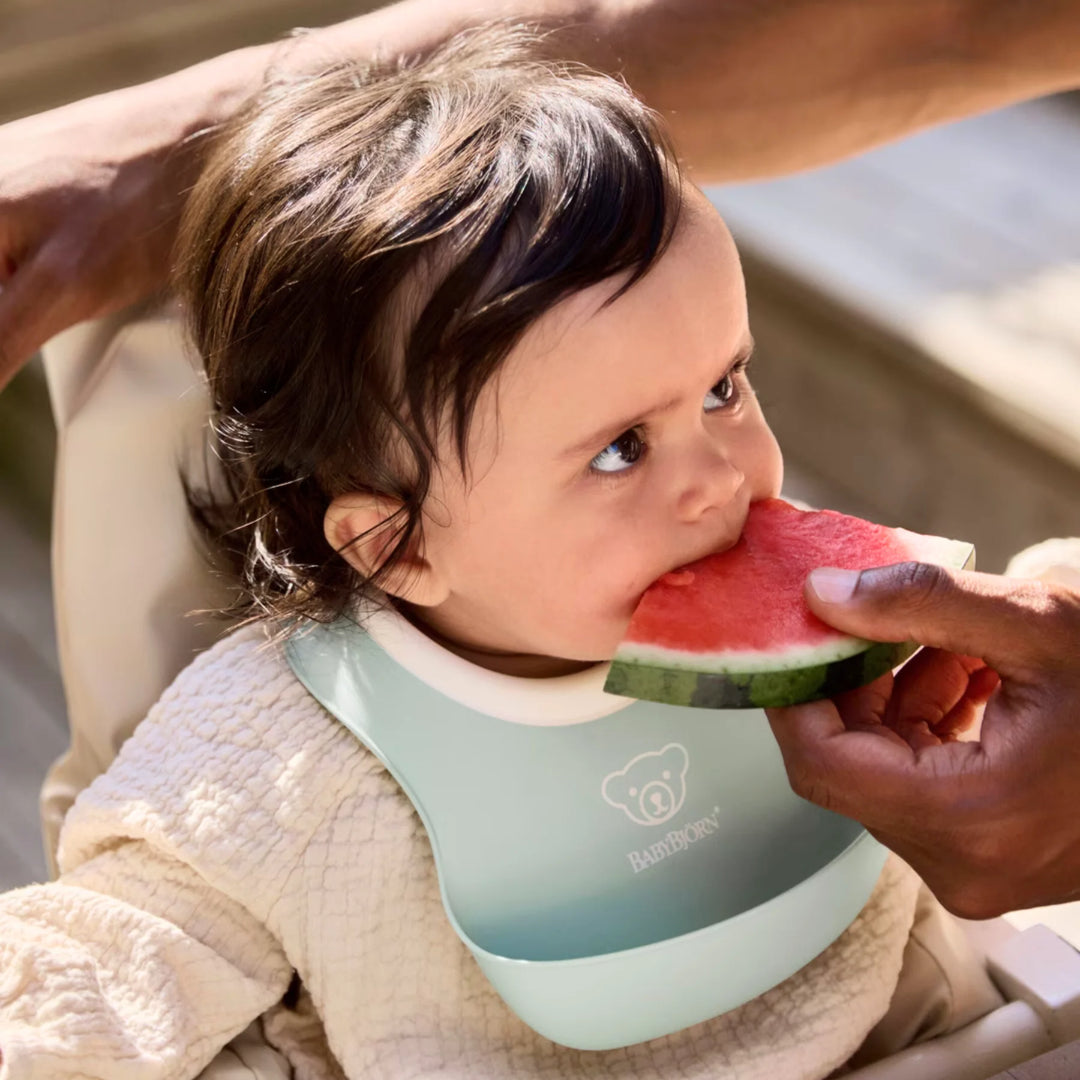 BabyBjörn silicone bibs for babies with ergonomic, easy-to-clean design.