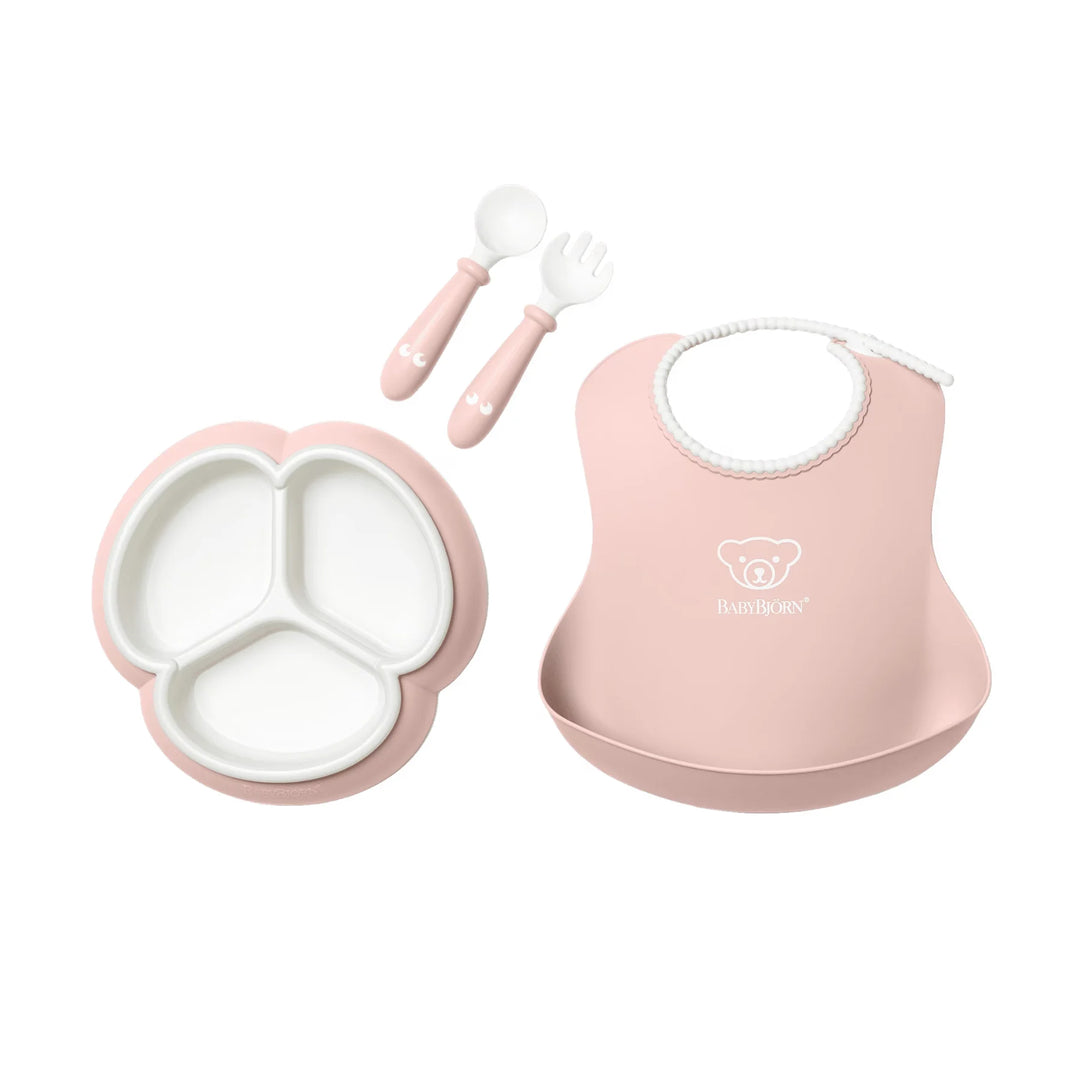 BabyBjörn Pink feeding set with fun shapes and easy-grip handles.