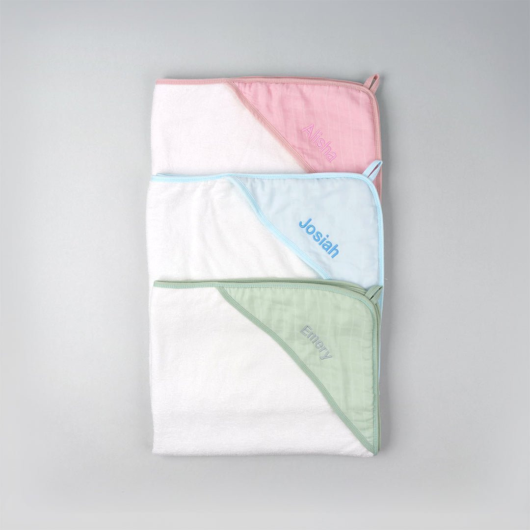 Personalised Bamboo Muslin Hooded Towel in pink, blue and green