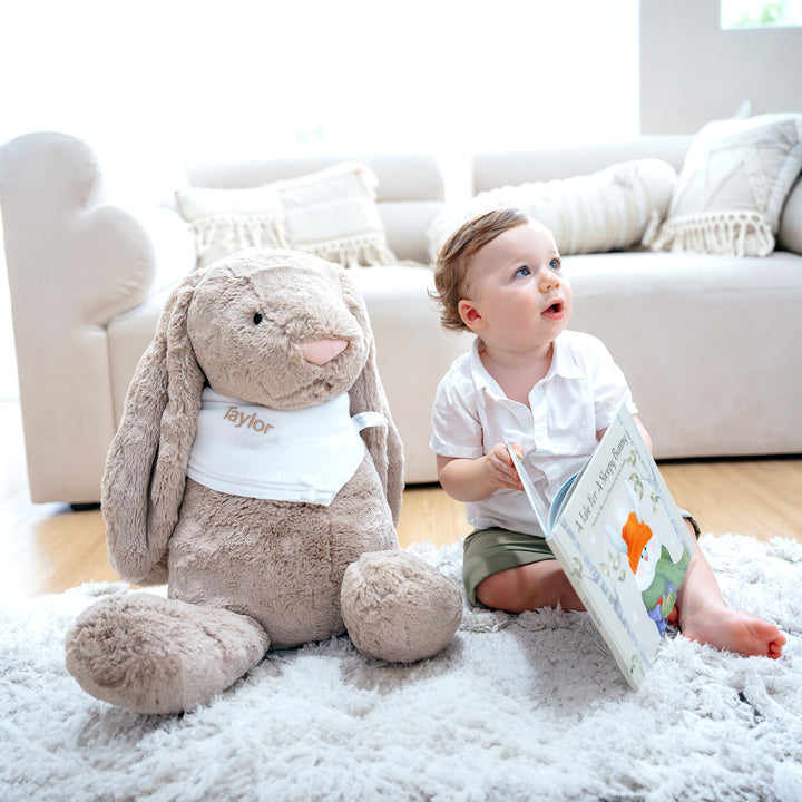 Baby with A Tale For A Sleepy Bunny Book and Giant Jellycat Bunny