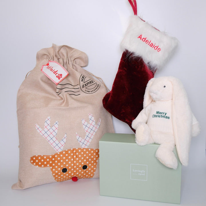 Magical Christmas gift set consisting of 3 products - reindeer jute sack, red stocking and christmas bunny