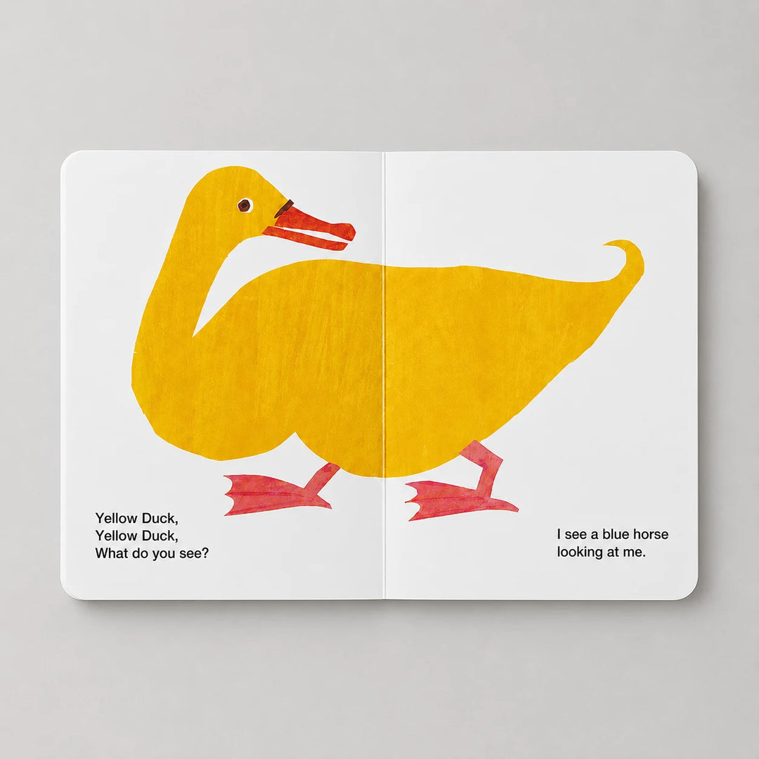 Brown Bear, Brown Bear, What Do You See? Book preview with a yellow duck illustration on a gray background