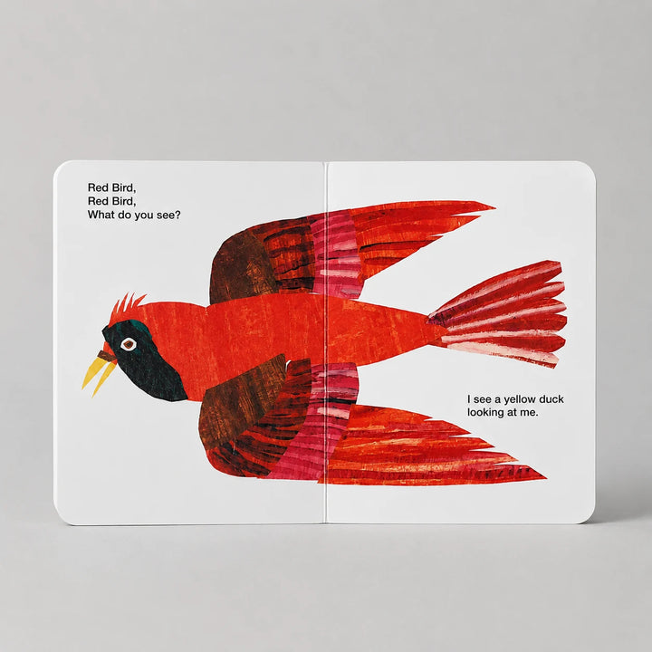 Brown Bear, Brown Bear, What Do You See? Book preview with a red bird illustration on a gray background