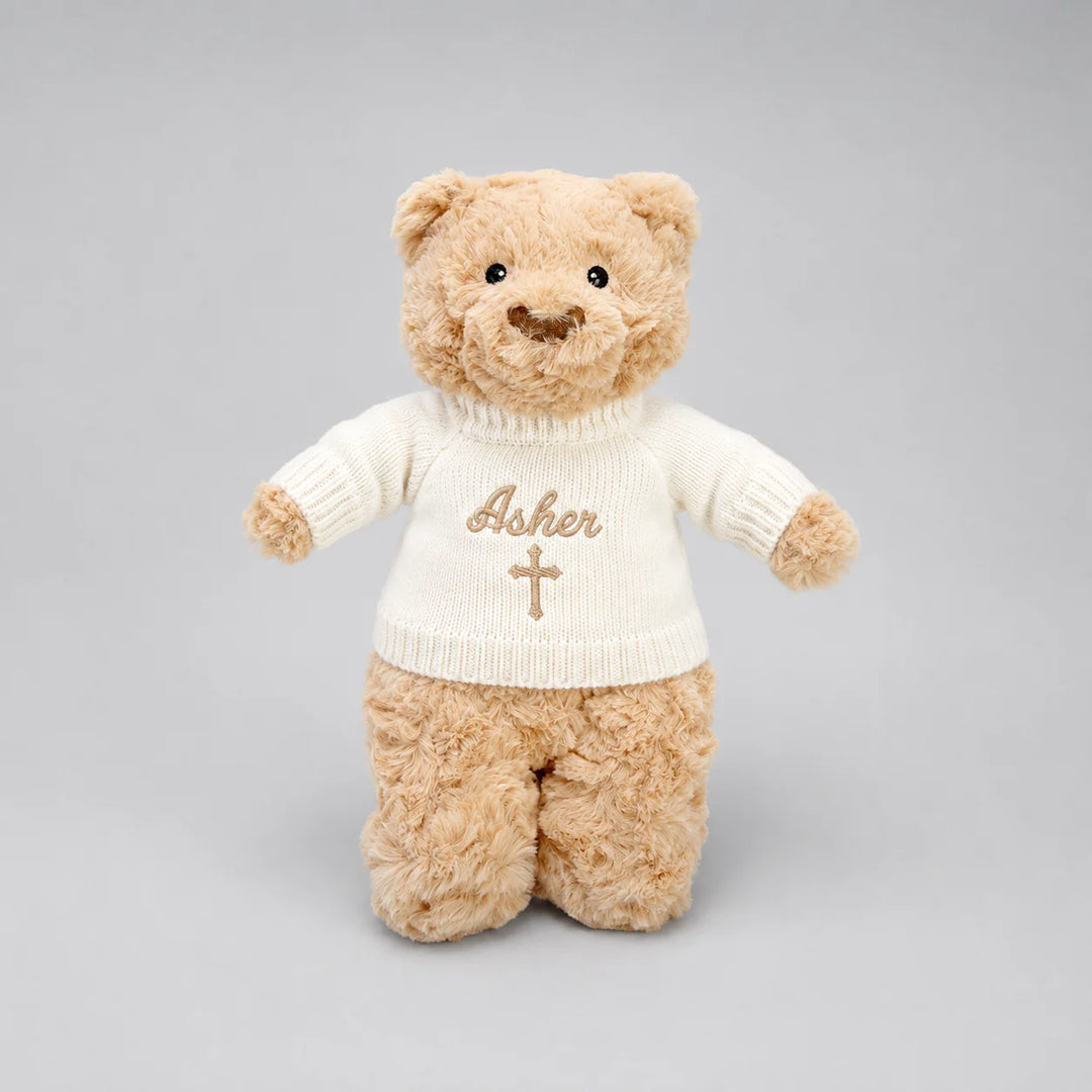 Personalised Christian teddy bear with embroidered name Asher and cross on cream jumper