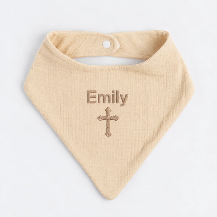 Personalised beige Christian baby bib with embroidered name Emily and cross