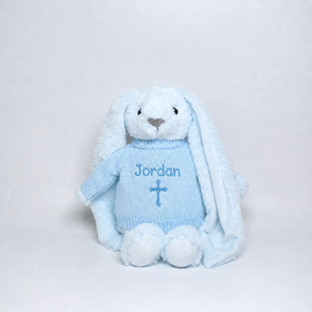 Personalised blue Christian bunny with embroidered name Jordan and cross on knitted jumper
