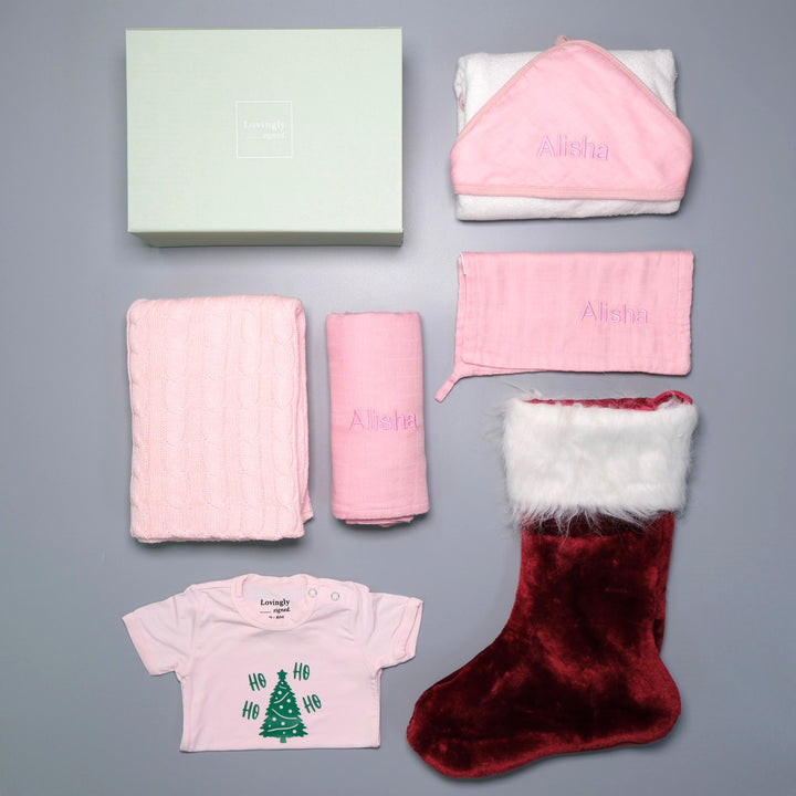 Christmas Themed Gift Set all in Pink with 6 products - Swaddle, Wash Cloth, Hooded Towel, Christmas Edition Babygrow, Bathrobe, Cable Knit Blanket and Red Stocking