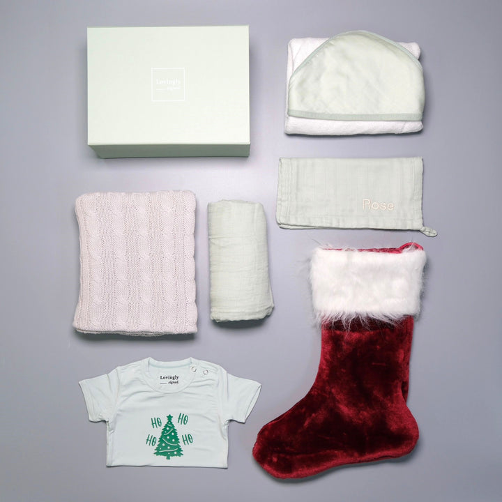 Christmas Themed Gift Set all in Green with 6 products - Swaddle, Wash Cloth, Hooded Towel, Christmas Edition Babygrow, Bathrobe, Cable Knit Blanket and Red Stocking