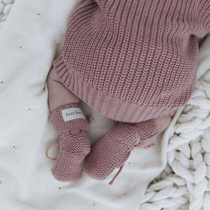 Baby wearing Cosy Roots Organic Knit Booties - Dusty Rose