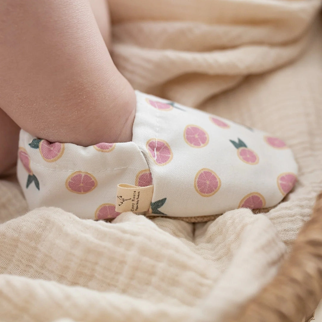 Baby wearing Cosy Roots Vegan Shoes - Little Grapefruits