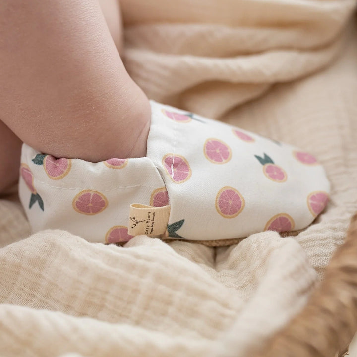 Baby wearing Cosy Roots Vegan Shoes - Little Grapefruits