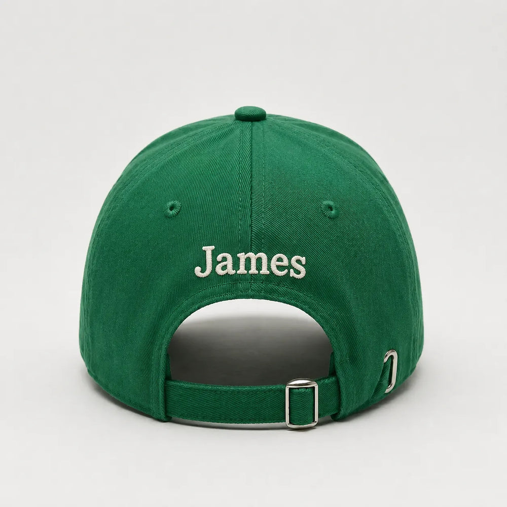 Green cap with 'James' embroidered on the back against a light gray background