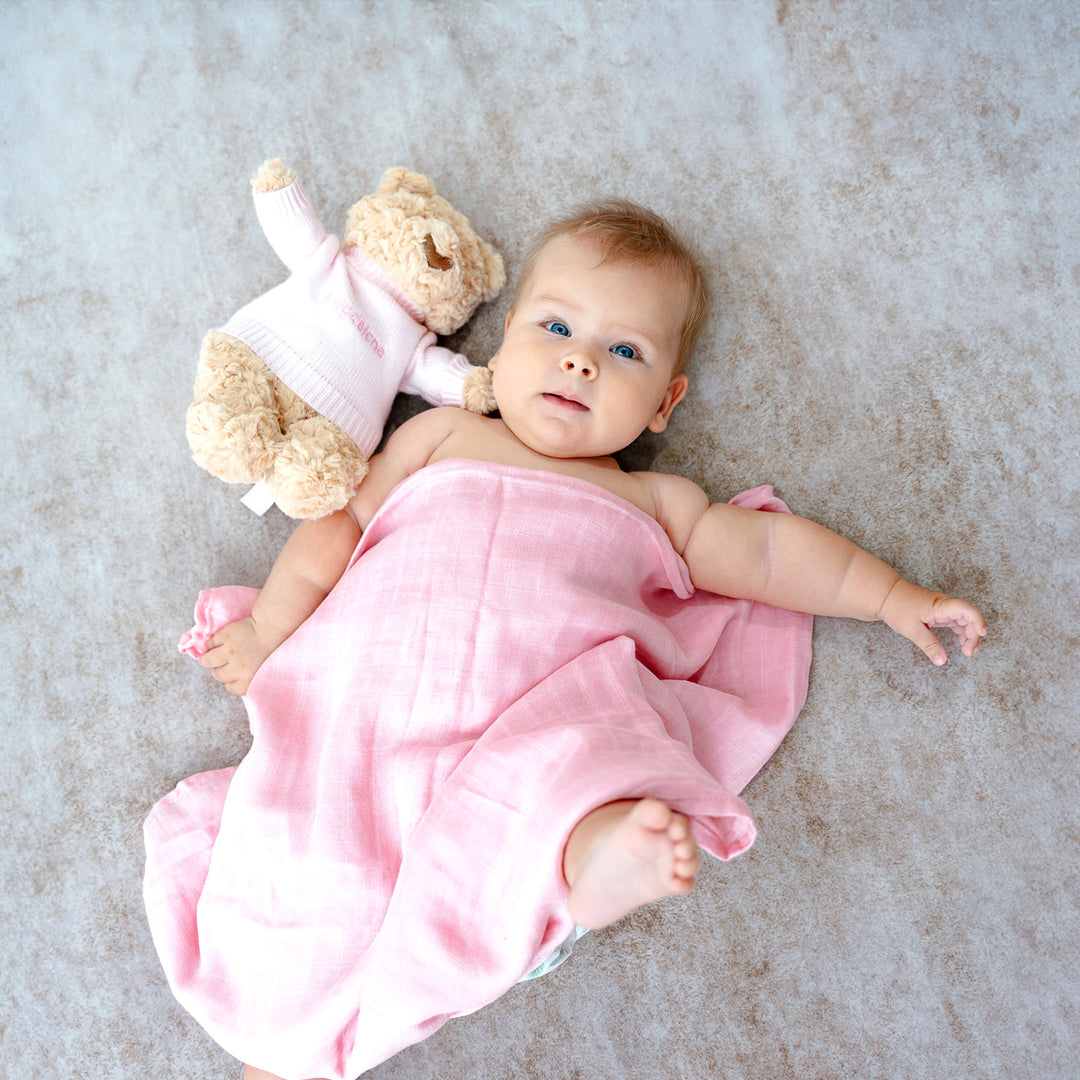 Baby with Hugsy Bear in Pink Swaddle