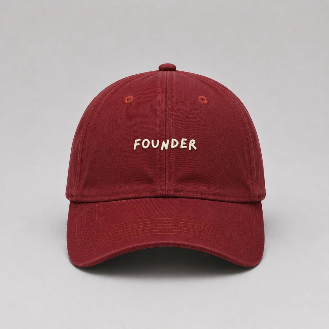 Red cap with 'FOUNDER' text on a gray background