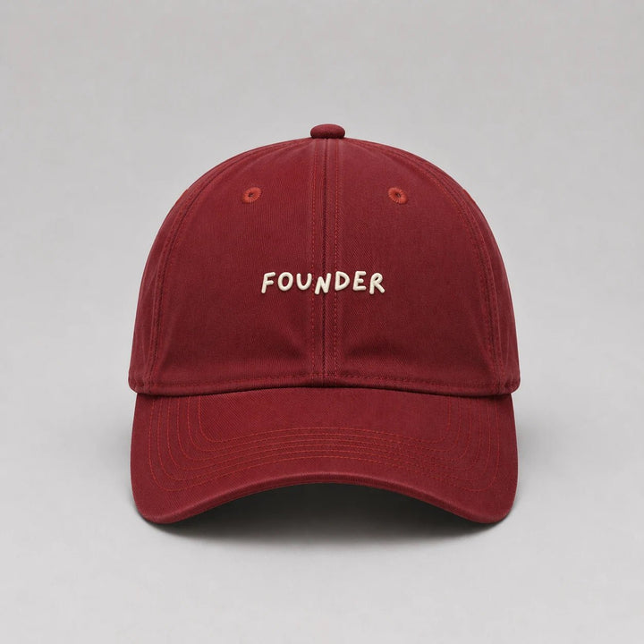 Red cap with 'FOUNDER' text on a gray background