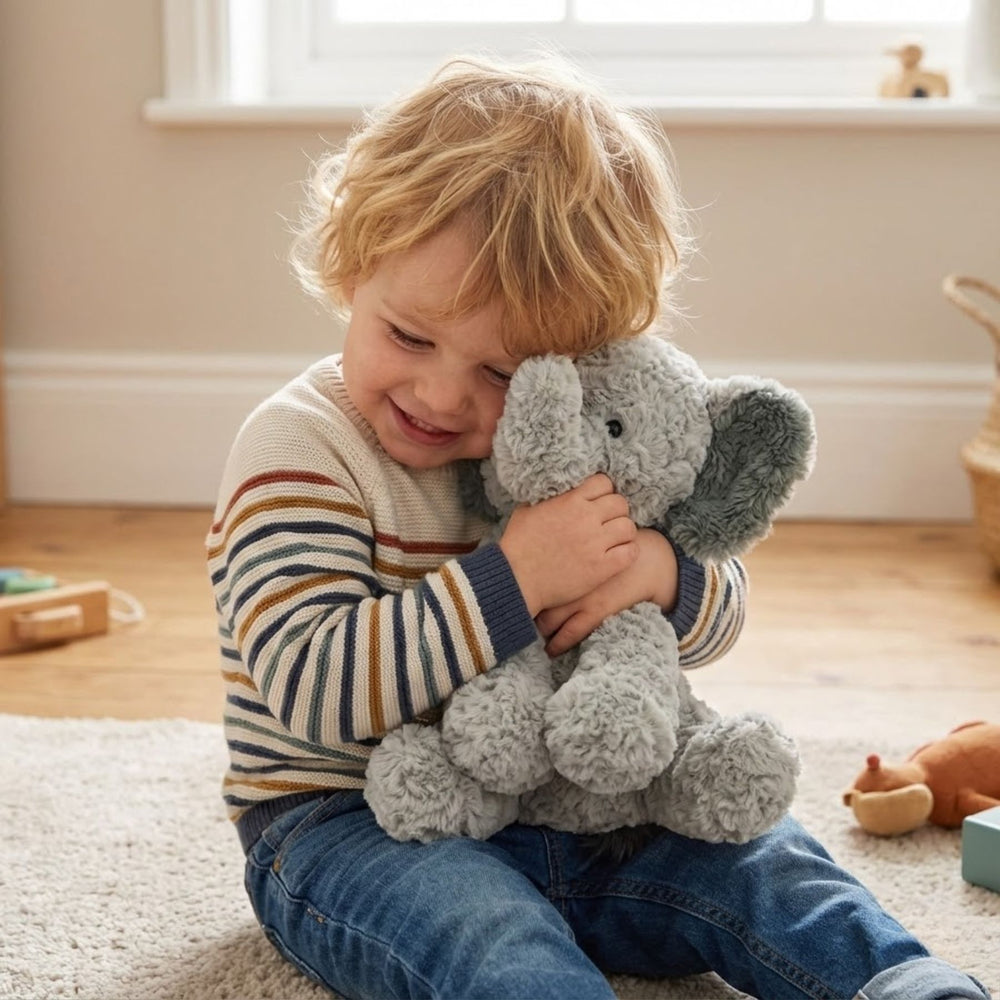 Boy hugging Gund Cozys Elephant 10 Inches