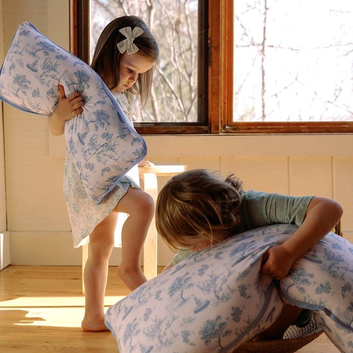 Children playing with House of Holly Luxe Cloud Pillow – Fruit Toile 