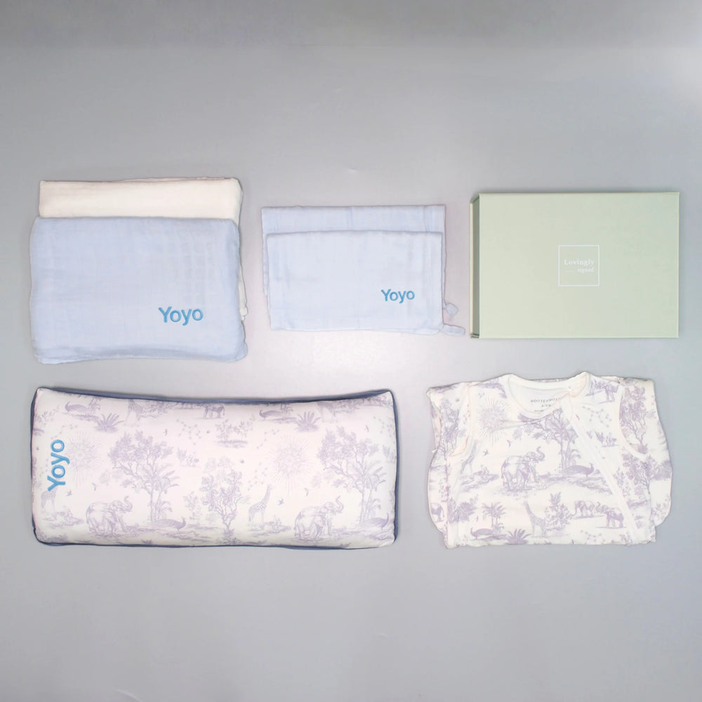 House of Holly x Lovingly Signed collection of baby product,s including swaddles, wash cloths, pillow and sleep bag.