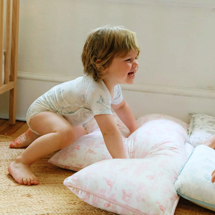 Gentle wrapover onesie for newborn with lions, zebras, and bears

