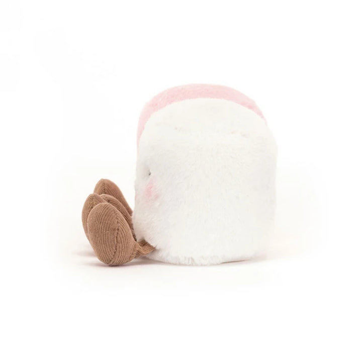 White marshmallow soft toy shown from the back, featuring fluffy plush fabric, a soft pink top and brown corduroy legs.