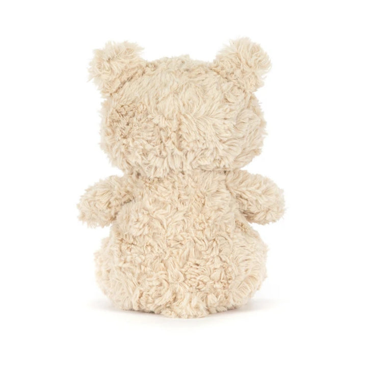 Back view of the cream Bartholomew Bear Junior soft toy, showing its fluffy fur, rounded body and small ears.