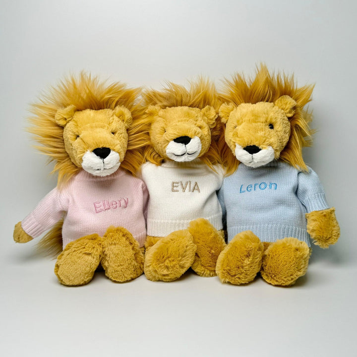 Jellycat Bashful Lion in customised pink, blue and cream jumper