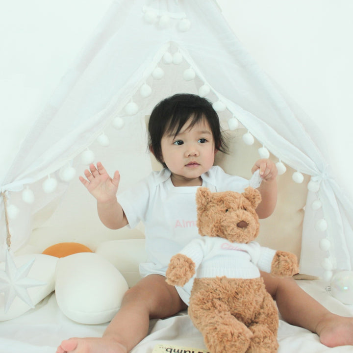 Toddler with Jellycat Bartholomew Bear