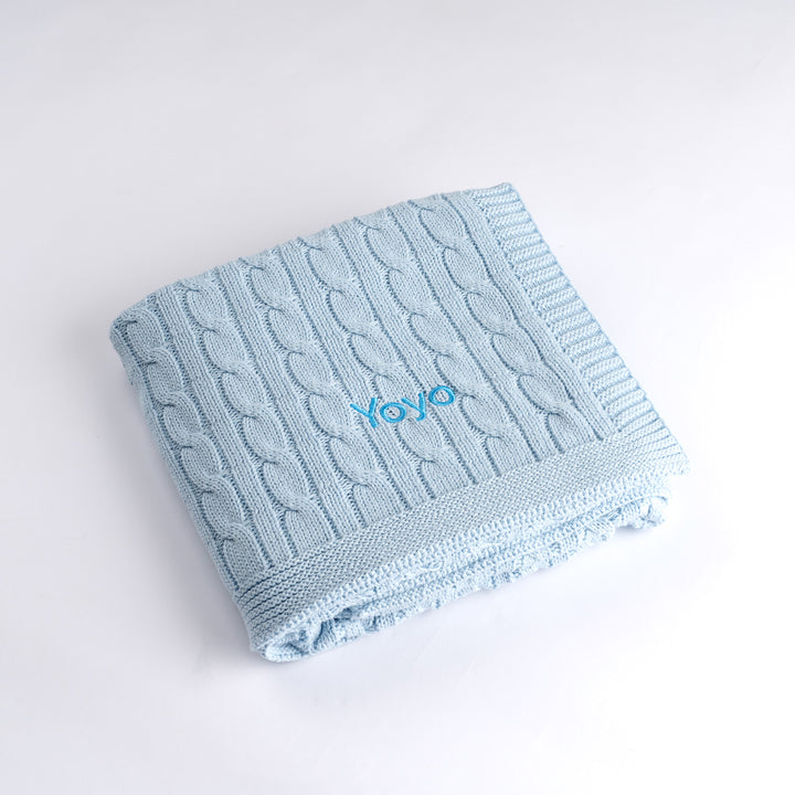 Wrap your baby in luxury with this personalised blue cable knit blanket. The ideal baby blankie gift