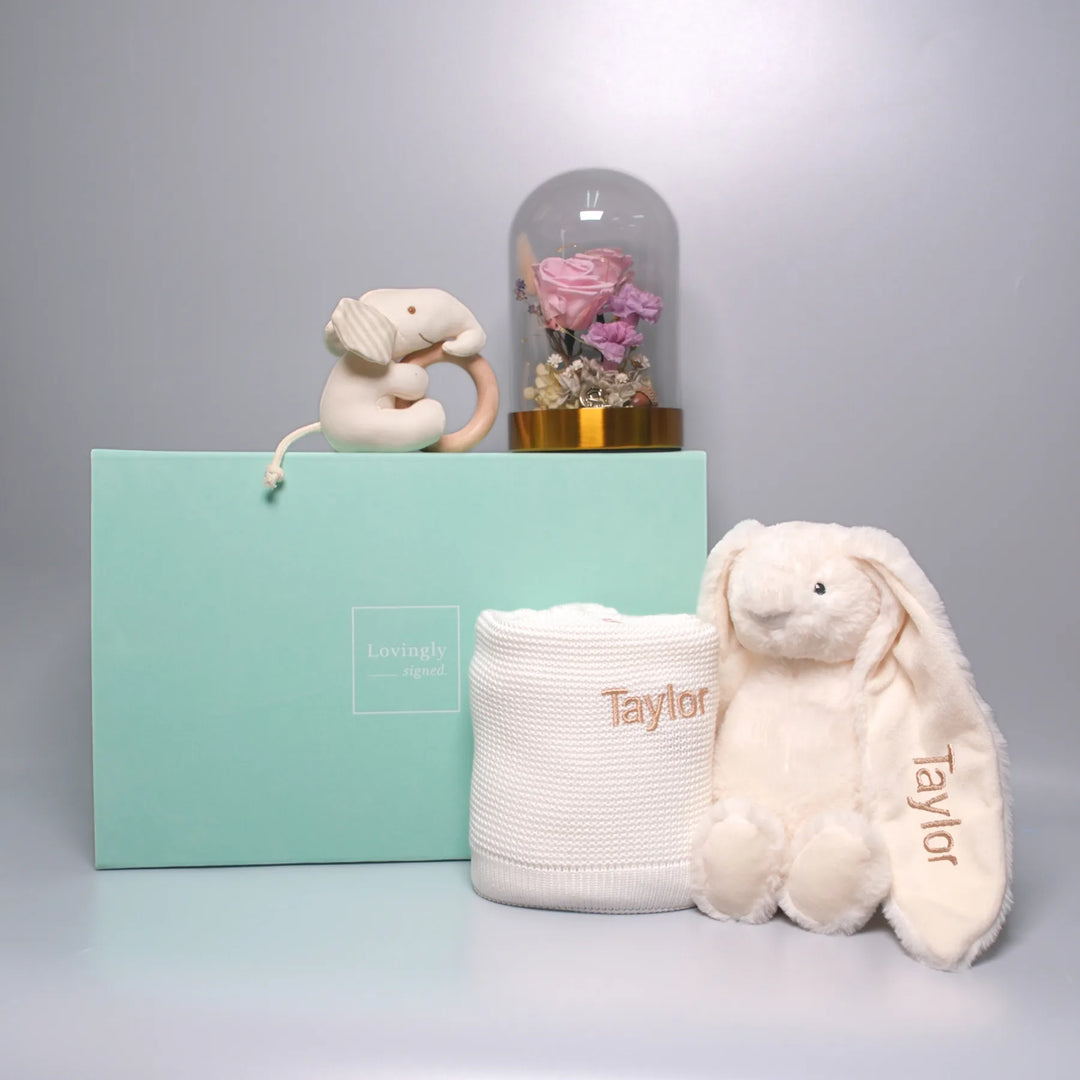 White Baby gift set with plush toys and blanket with a preserved flower bell jar 