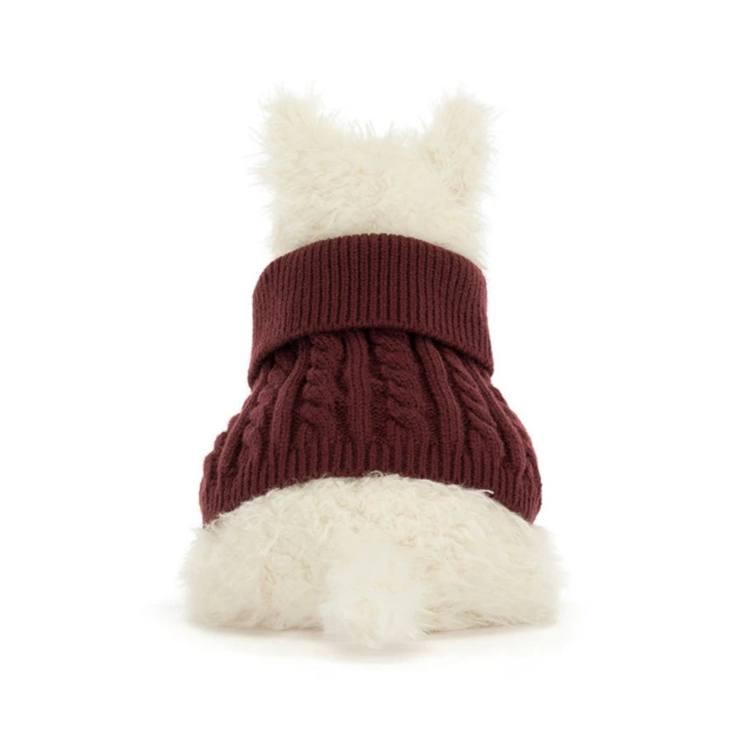 Back view of Jellycat Munro Scottie Dog plush toy, showing its burgundy cable-knit jumper, fluffy cream ears and tail.