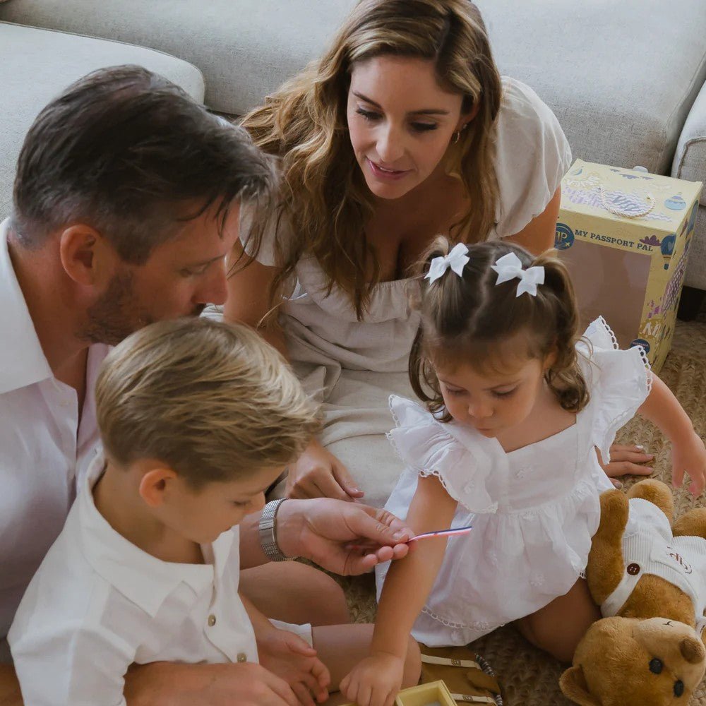 A family of 4 picking flagit for the teddy