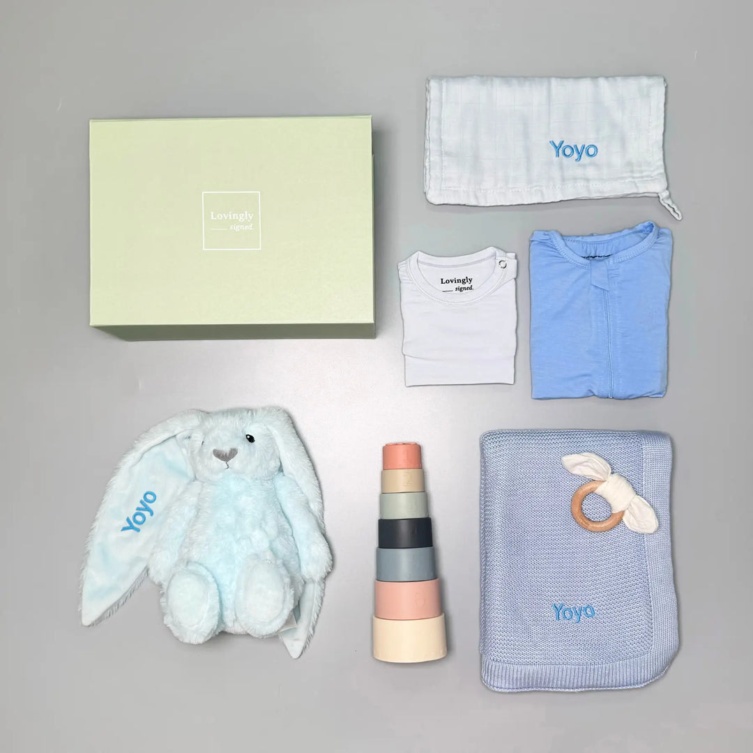 New Beginnings Baby hamper Gift Set in Blue - Essential Clothings, Blanket, Wash Cloth, Bunny Soft Toy, Stacking Toy and Teether

