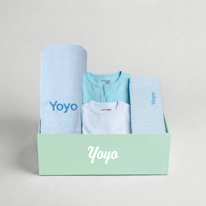 Soft blue bamboo gift set for newborns with swaddle, wash cloth, babygrow and bodysuit