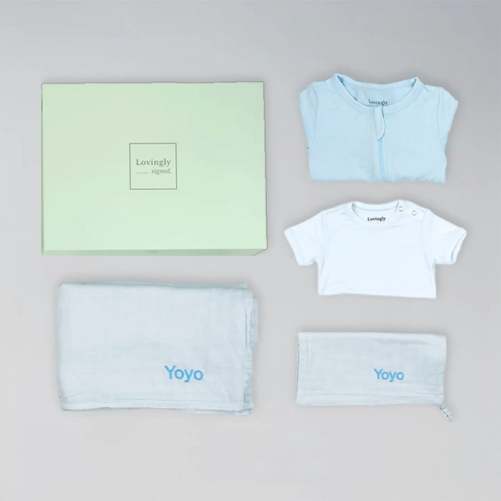 Soft blue bamboo gift set for newborns with swaddle, wash cloth, babygrow and bodysuit