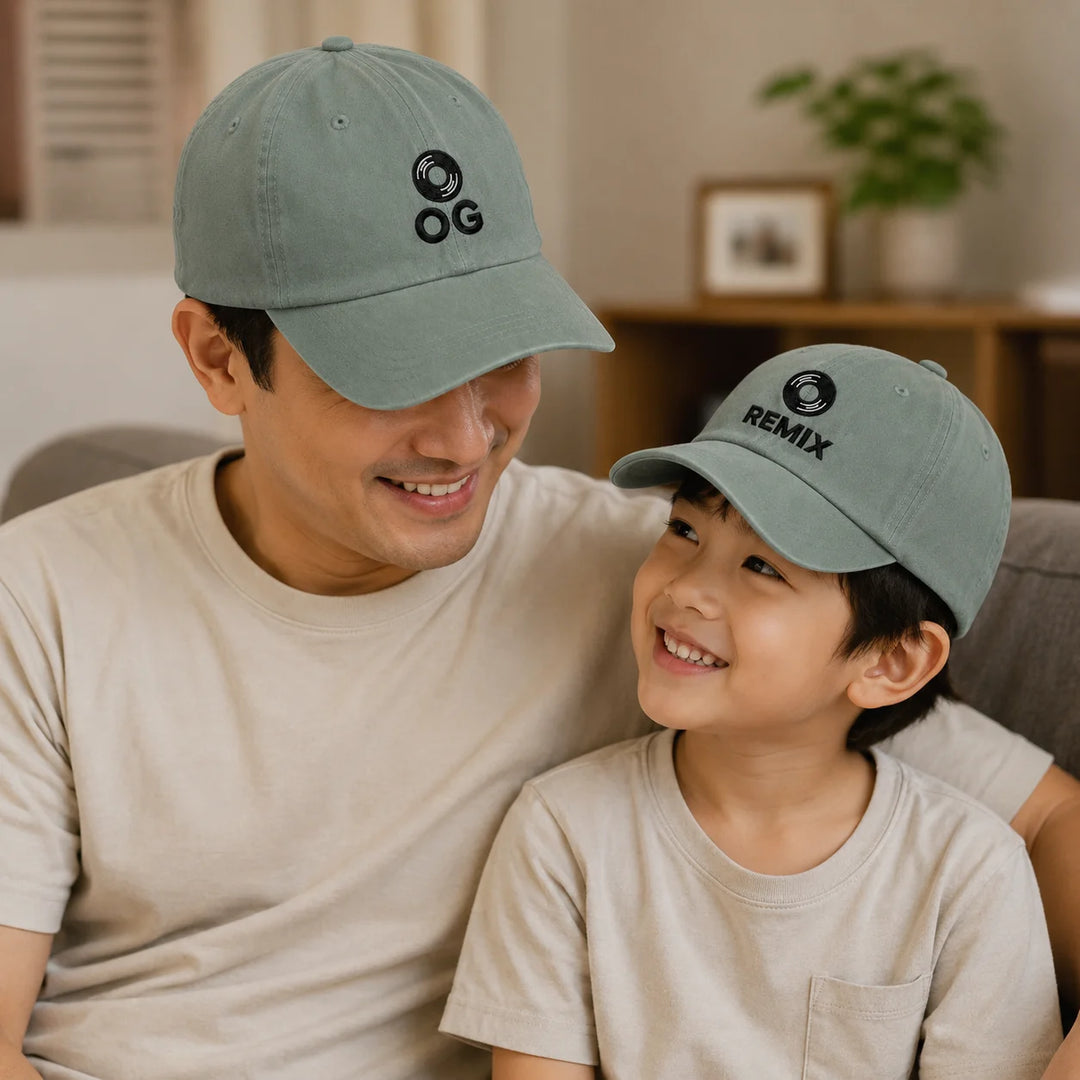 Man and child wearing matching light green caps indoors